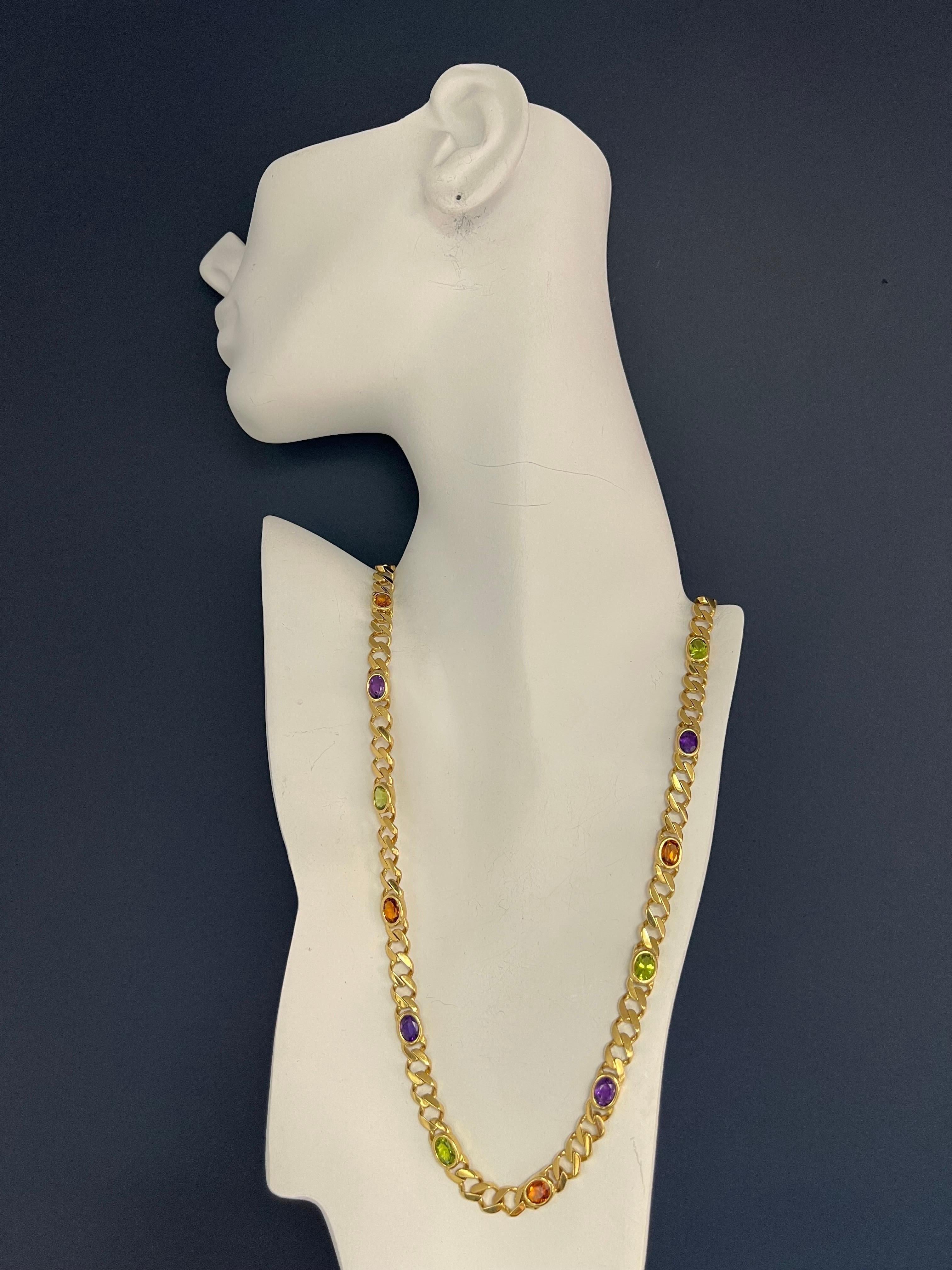 Magnificent Retro 14k Yellow Gold Necklace & Bracelet SET. The piece is set with 26 carats (approximate) of oval citrine, amethyst, and peridots. Circa 1980.

The Necklace is 24