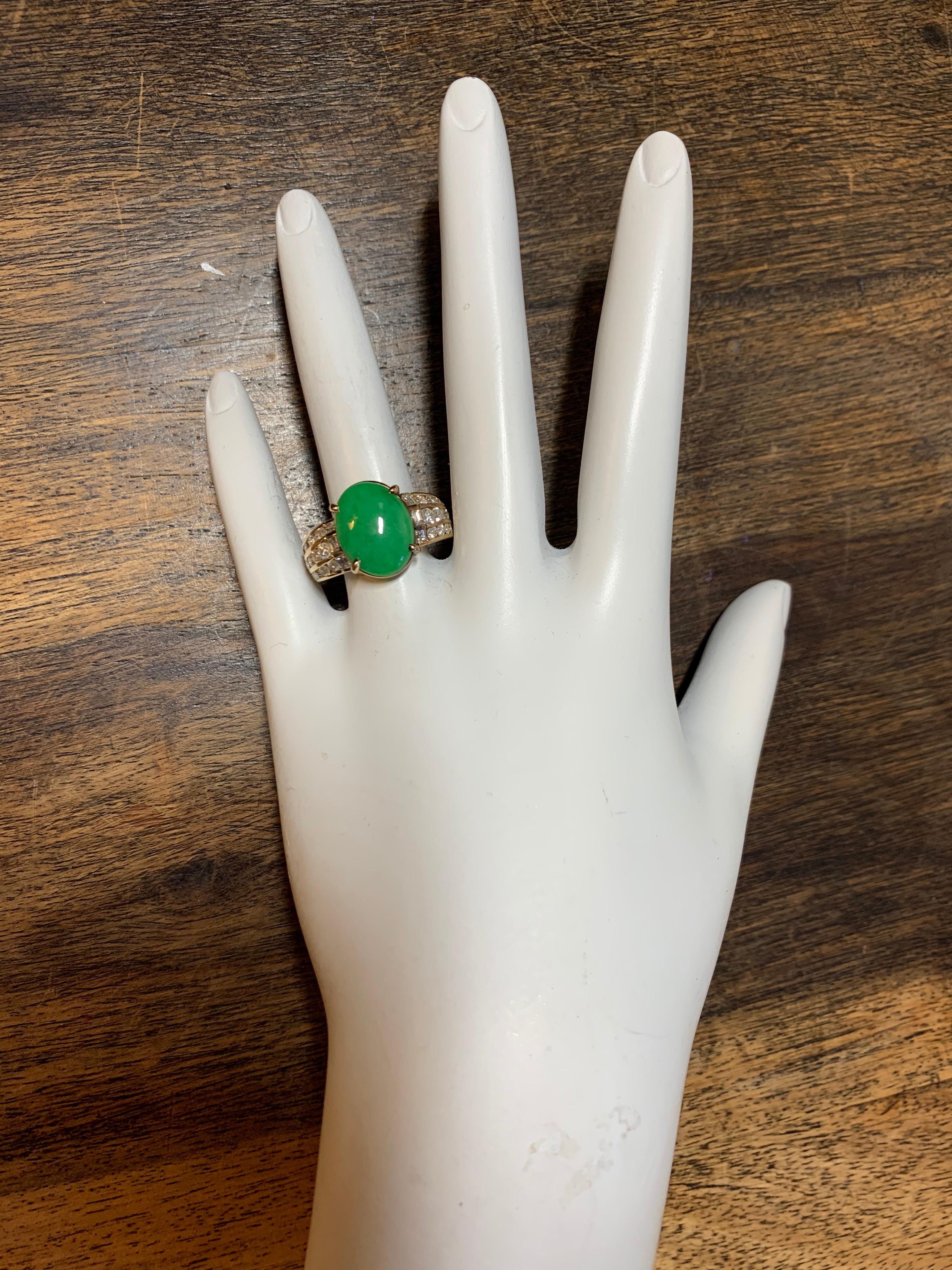 Retro 14k Yellow Gold Cocktail Ring Natural GIA Certified (report#2201994913) Jadeite Jade measuring 13.38x10.32x2.83mm (3.47 carats) & 36 round brilliant diamonds and 6 baguettes (approx 1.85 carats), G-I in color and VS-I clarity), Circa 1950.
