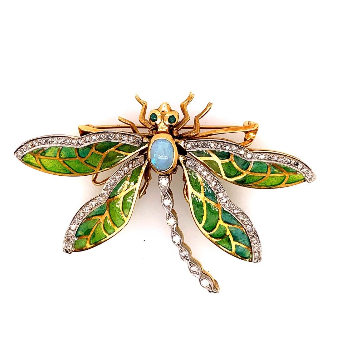 Retro Yellow Gold Butterfly Opal & Enamel Brooche. Circa 1960. 

Set in the brooche are 83 natural round diamonds weighing approximately 1.35 carats and one natural opal weighing approximately 1 carat (7.8x6x3.5mm). 

The piece weighs 24.5 grams. 