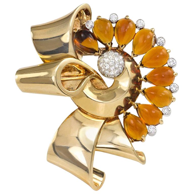 Retro Gold, Cabochon Citrine, and Diamond Stylized Bow Brooch For Sale
