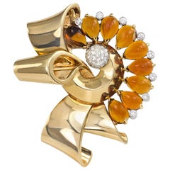 Retro Gold, Cabochon Citrine, and Diamond Stylized Bow Brooch