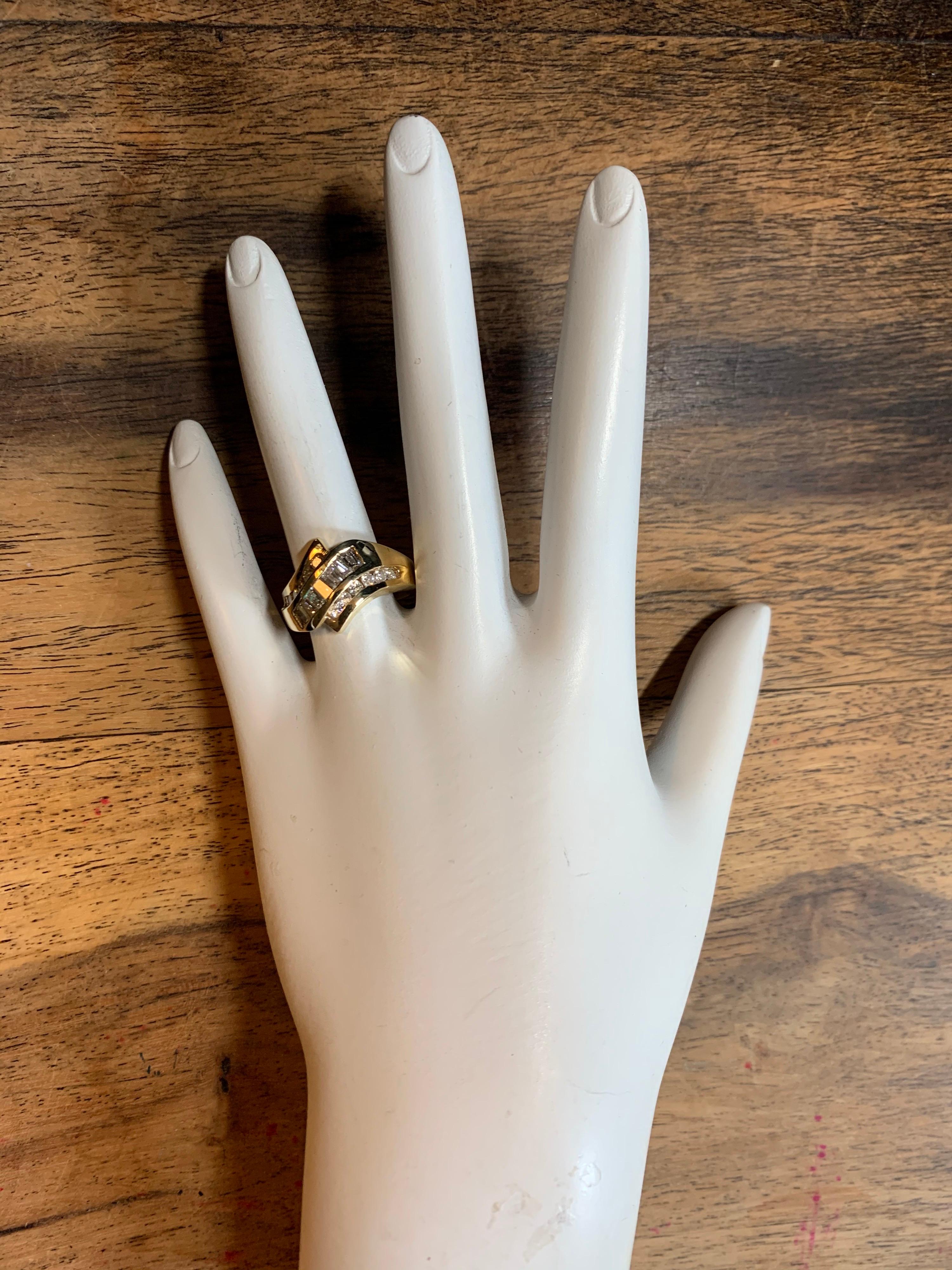 Retro 14k Yellow Gold Cocktail Ring set with approximately 1.25 Carats of Natural 12 Round & 7 Baguette Diamonds. Color is approximately G-I and clarity is VS-I.

The ring weighs 5.5 grams and size is 6.5.

Circa 1960. Condition is Pre-owned. 