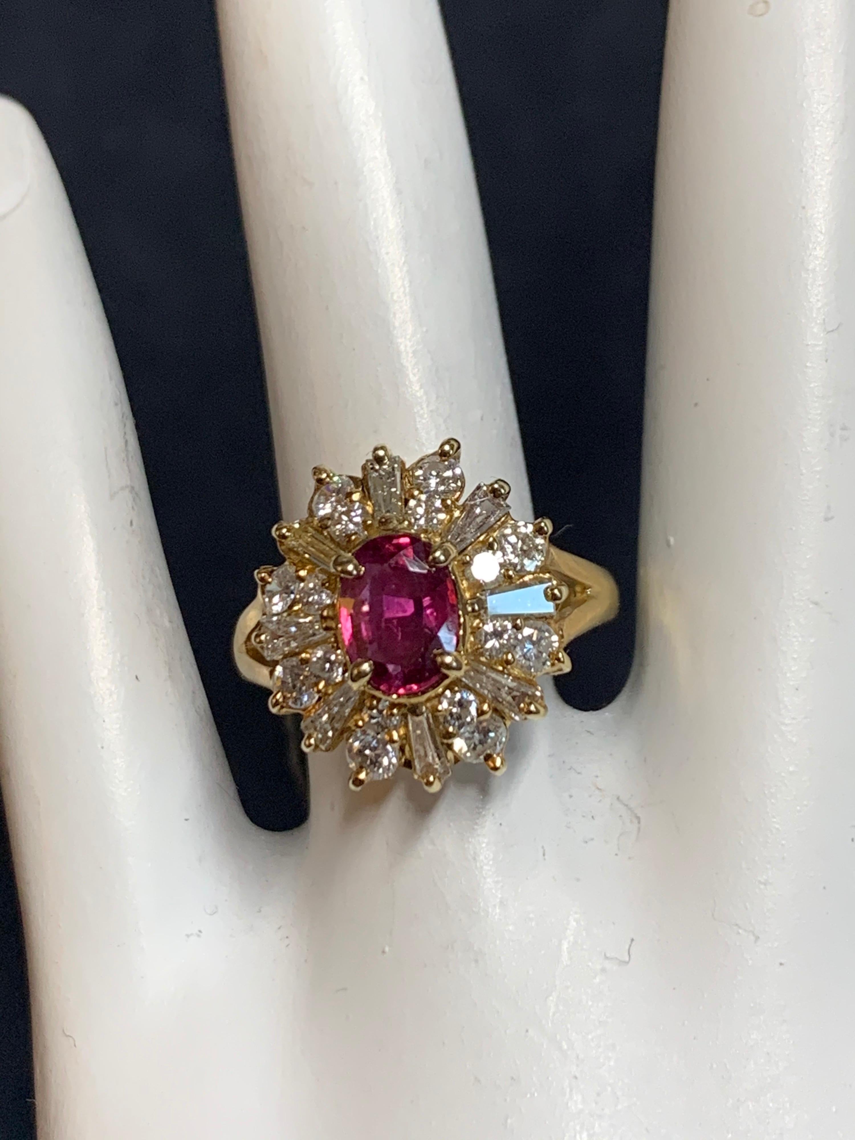 Retro 14k Yellow Gold Cocktail Ring 1.85 Carat Natural Oval Ruby & Diamond Cocktail Circa 1960.

The Natural Oval Ruby weights are approximately 0.85 carats (7x5.2x2.5mm) along with 24 natural round & baguette diamonds (G-I color & VS-I clarity)