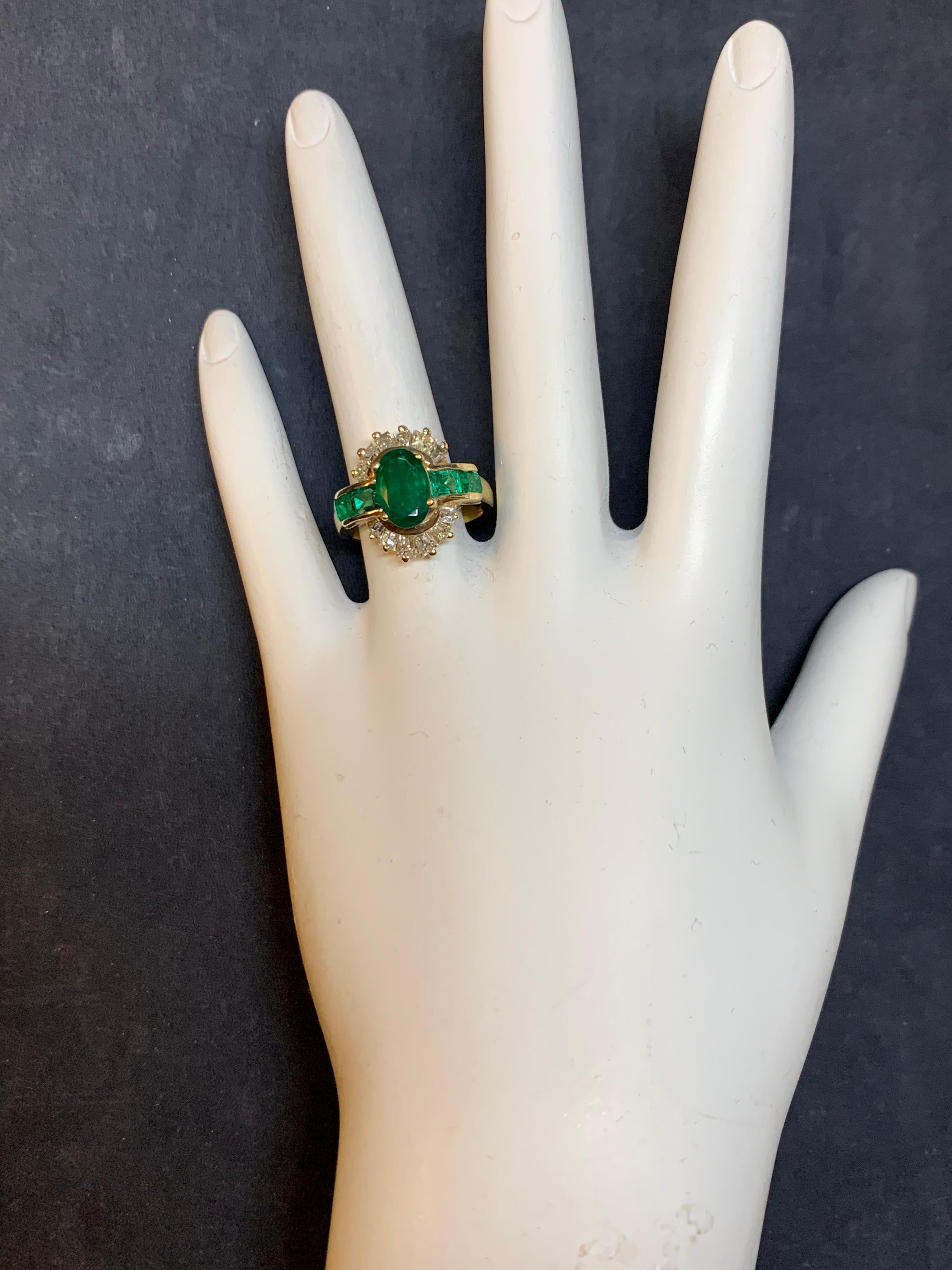 Retro 14k Yellow Gold Cocktail Ringset with approximately 3.10 Carats of Natural Diamonds & Oval Green Emerald.

The center oval measurements are 9.1x5.95x3.5 and weighs approximately 1.50 carats. The four sidestone natural emeralds weigh