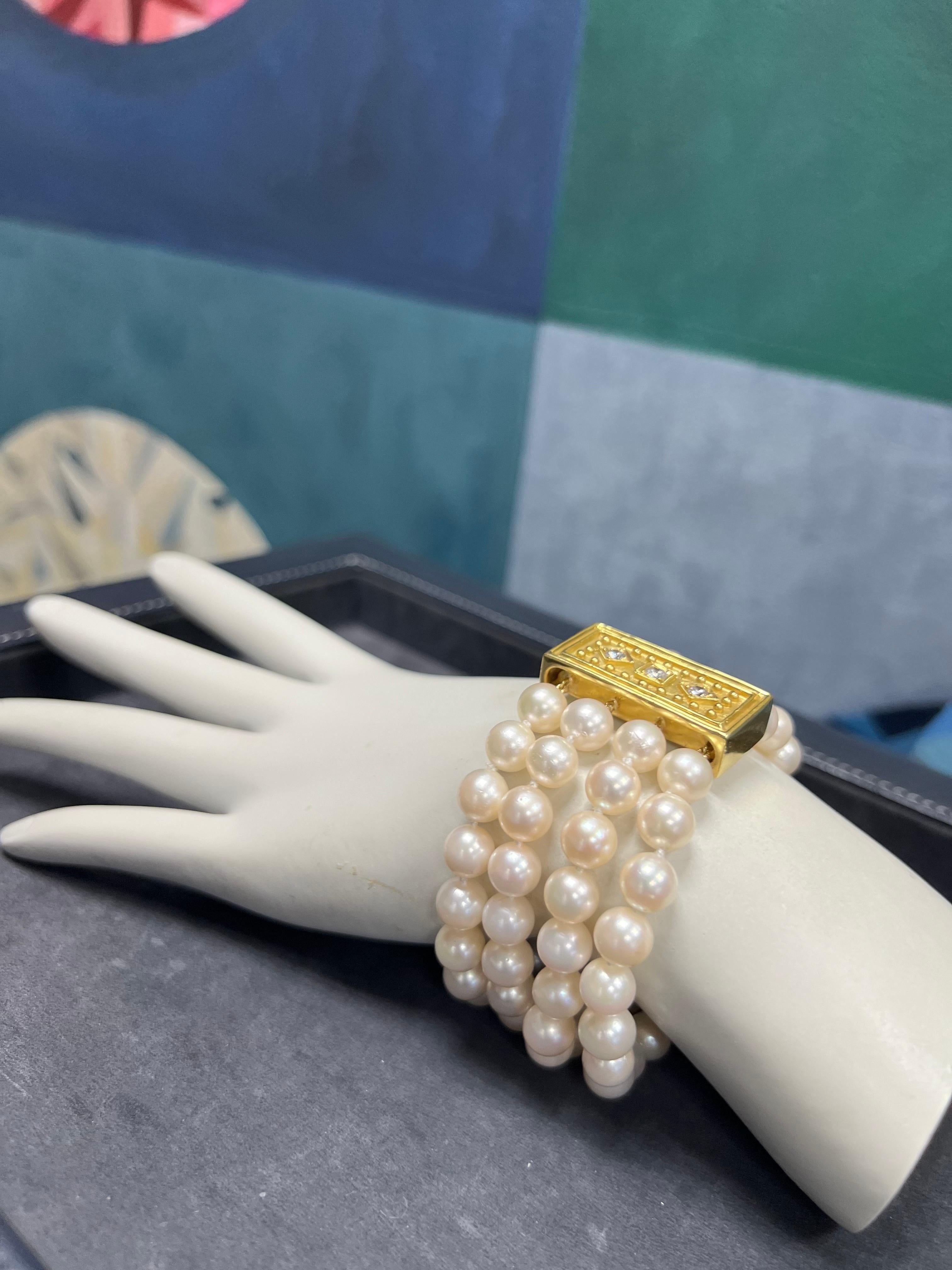 A magnificent four strand cultured Akoya pearl bracelet, Circa 1980. Each of the 80 pearls measure approximately 7.5mm in diameter and have great luster and orient. There are very subtle surface blemishes, but nothing takes away from the beauty of