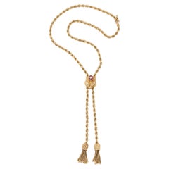 Used Gold Lariat on Rope Twist Chain with Tassels and a Ruby and Pearl Flower