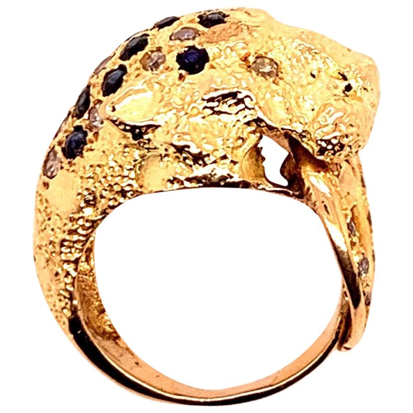 Bague rétro en or avec lion APX 0,50 carat, diamant naturel, saphir et pierre précieuse, datant d'environ 1960 en vente