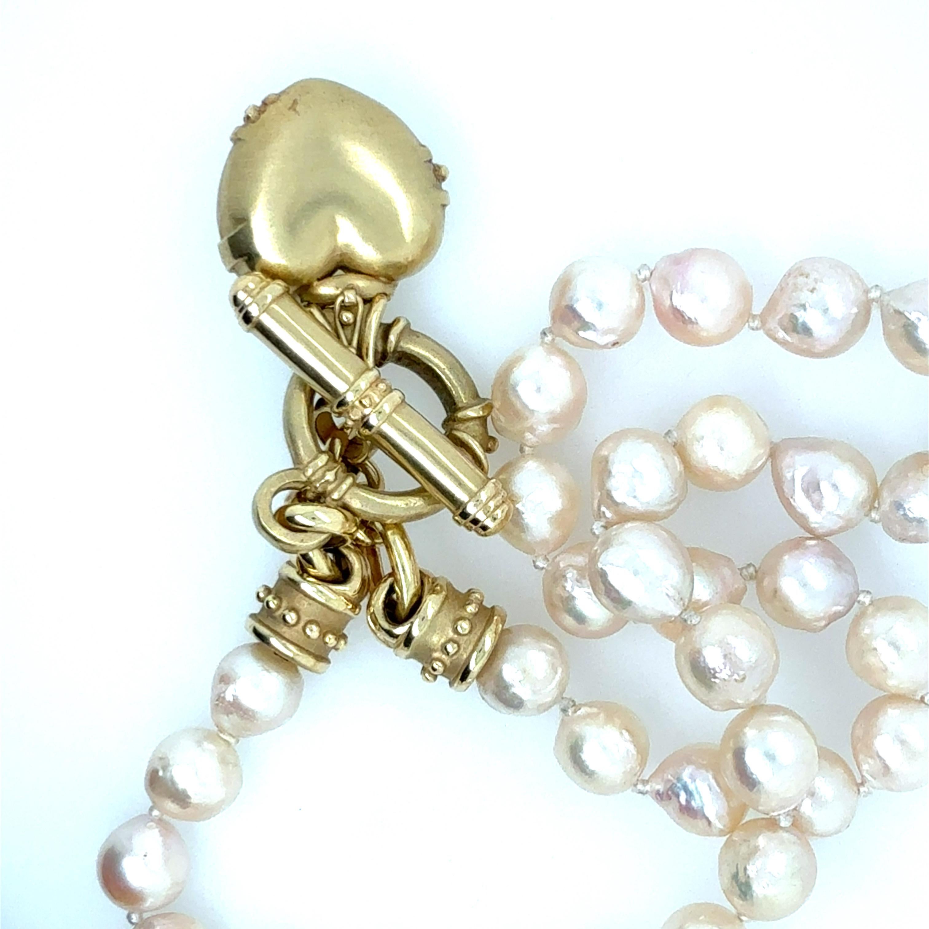 Collana retrò in oro con diamanti naturali e perle con chiusura a cuore 1980 In condizioni buone in vendita a Los Angeles, CA