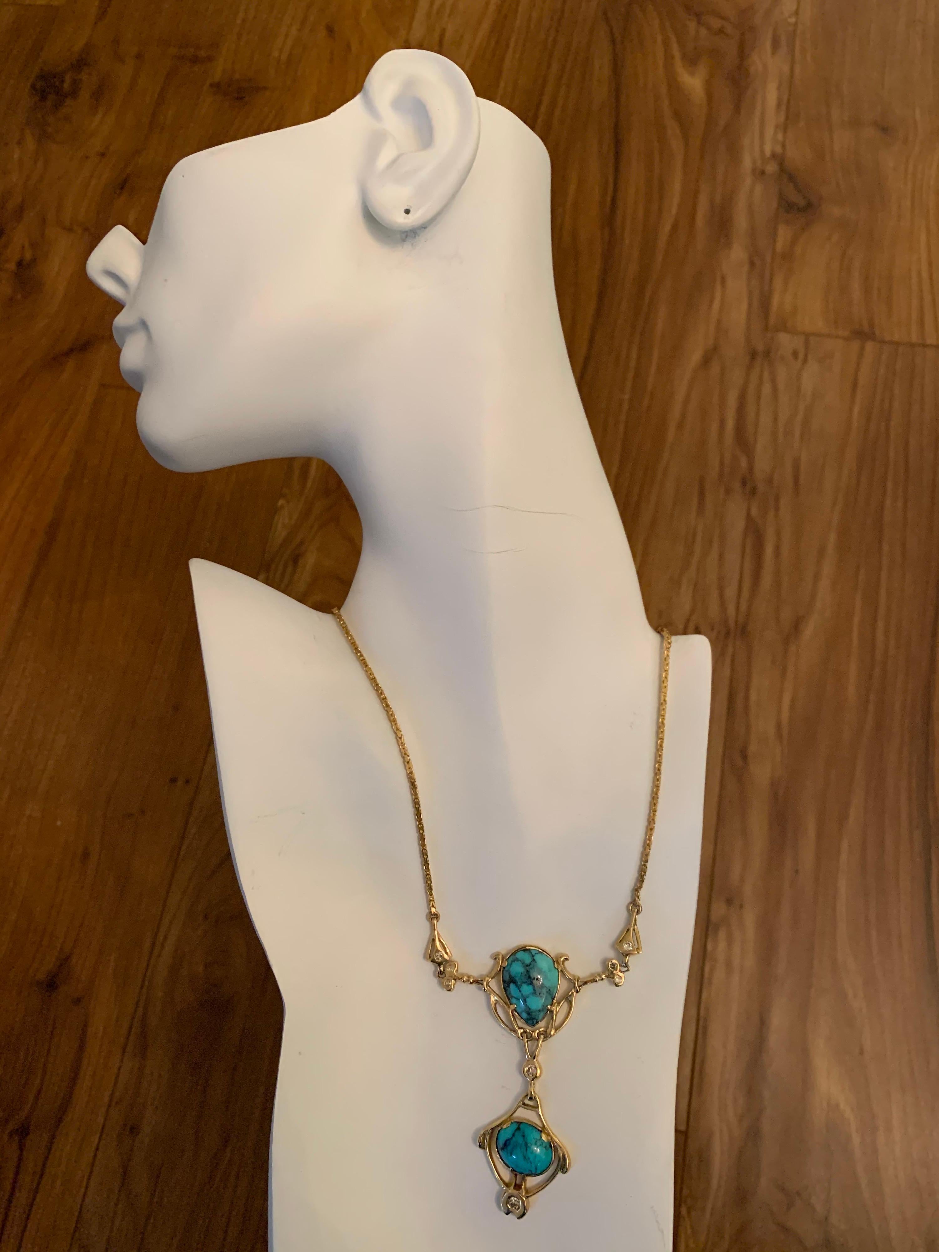 Stunning 14k Yellow Gold Necklace 19 inches in length.

The stone is set with Turquoise and 8 Natural Round Brilliant diamonds weighing approximately 0.65 carats.

The piece weighs 29.3 grams. 

Circa 1950.