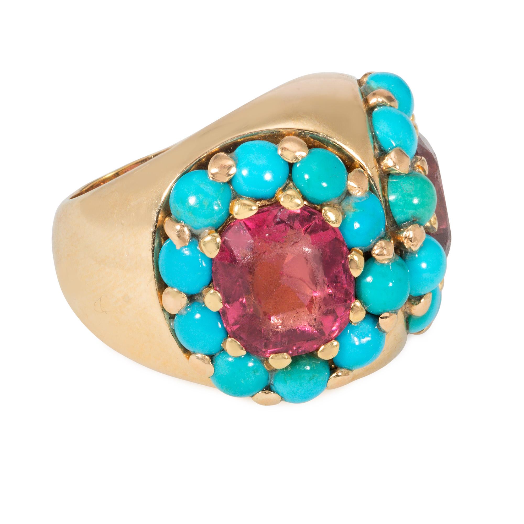 A Retro gold, tourmaline, and turquoise cocktail ring of beveled double cluster design comprising two opposing oval pink tourmalines, each set within borders of cabochon turquoise, in 18k.  French import.  Face-up dimensions approximately 0.75