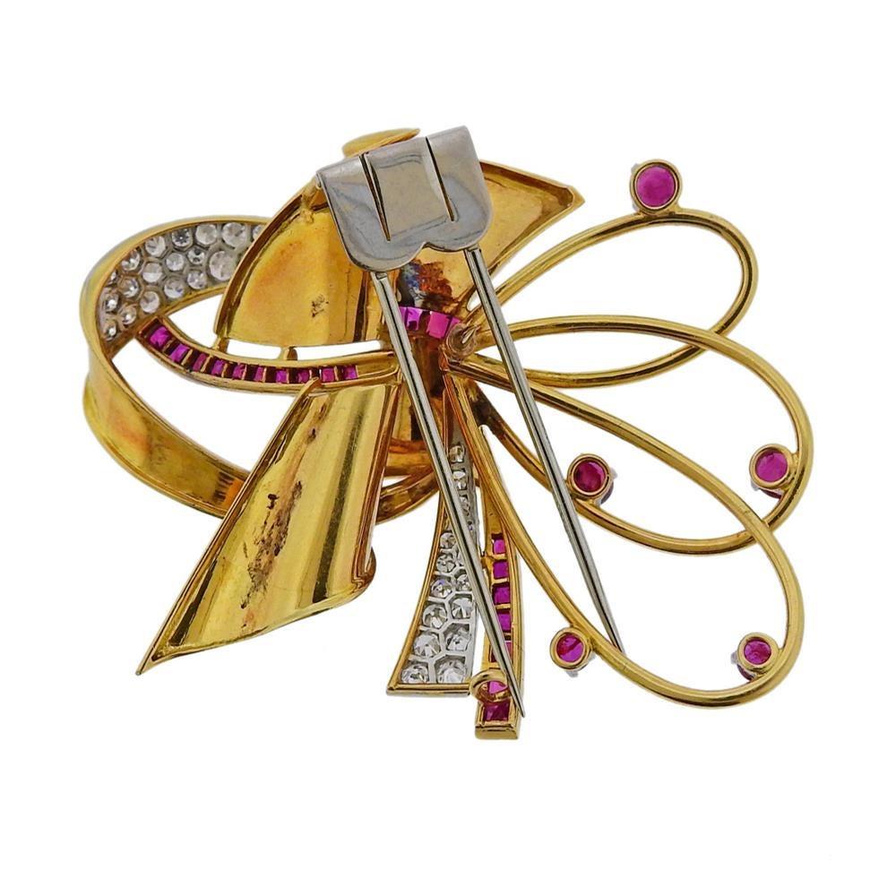 Retro circa 1940-1950s 18k gold and platinum accept brooch, set with rubies and approx. 0.70ctw in diamonds. Brooch is 48mm x 64mm. Tested 18k. Weight 26.4 grams.