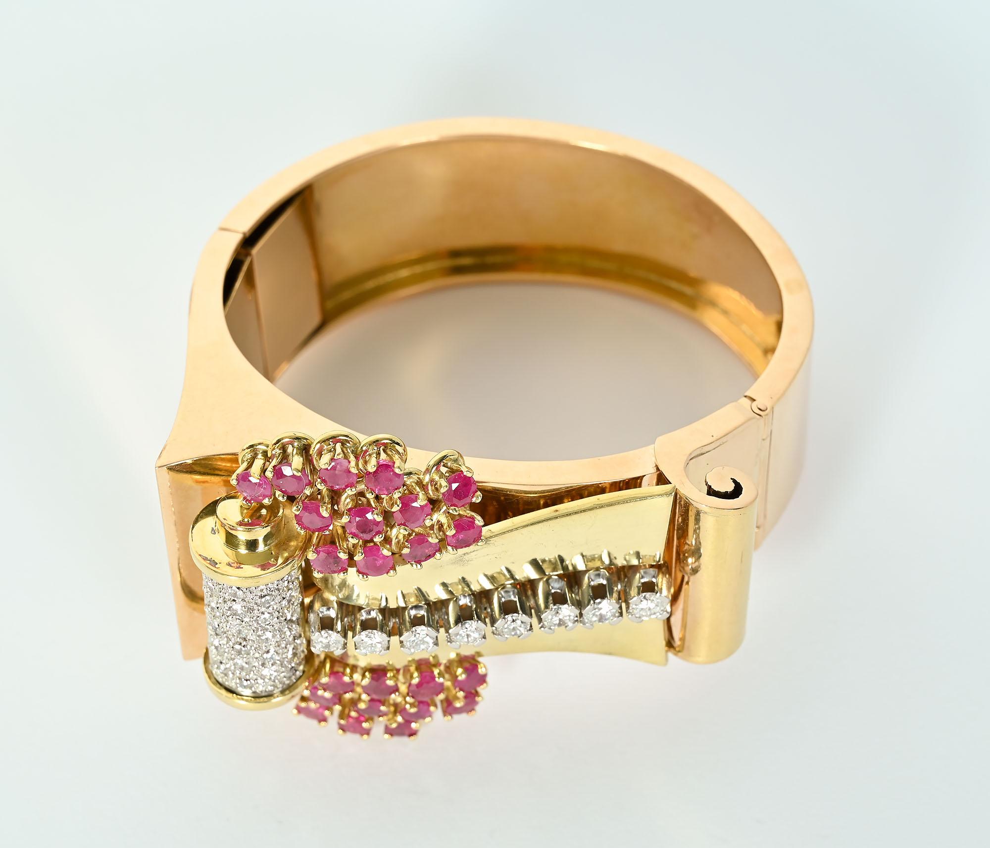 Stupendous would not be too strong a superlative to describe this  14 karat gold Retro bracelet with rubies and diamonds. In addition to being an imposing bracelet, it can be separated into a brooch as well, It has 2.13 carats of round brilliant cut