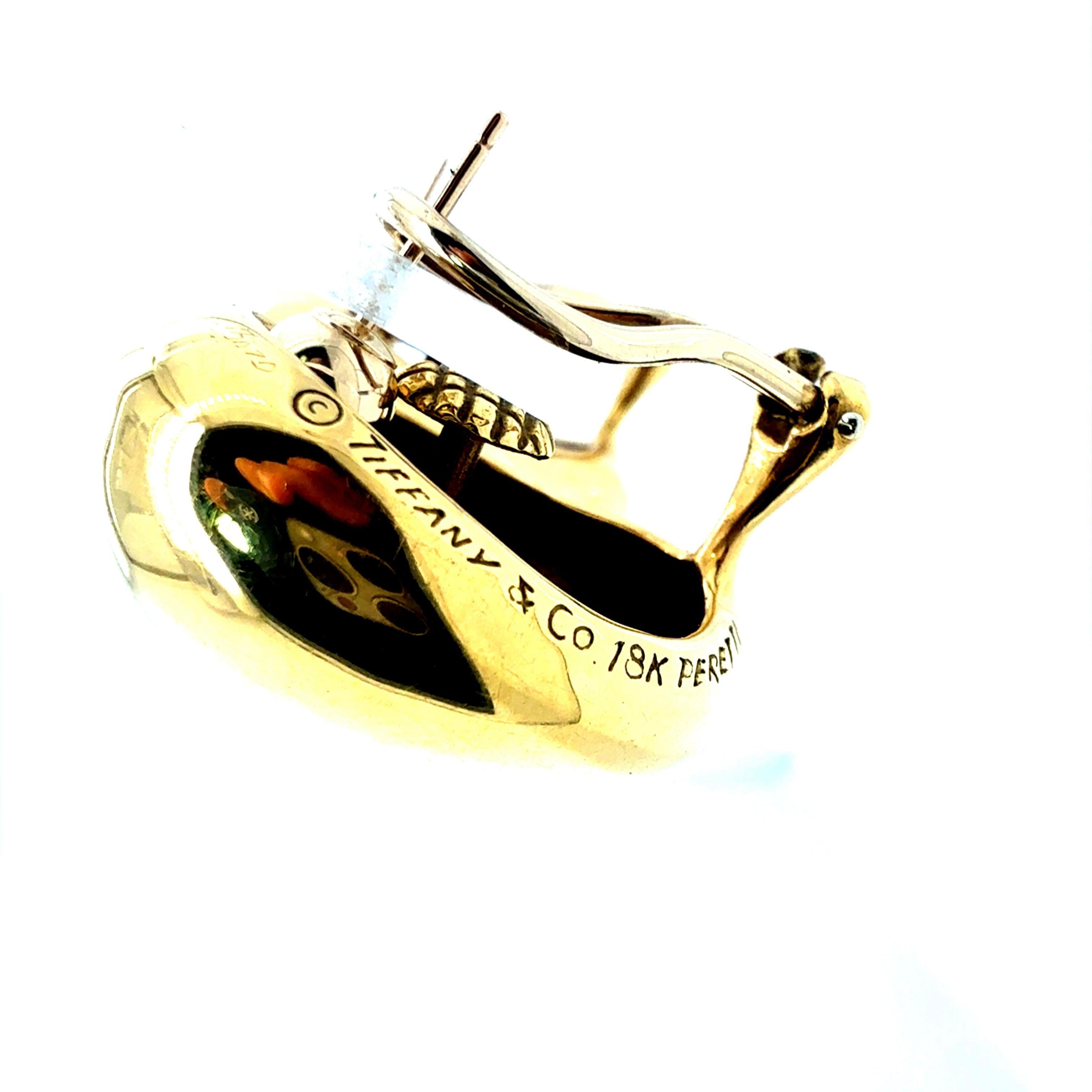 Retro Gold Tiffany & Co. Signed Peretti Thumbprint Clip Statement Earrings In Good Condition For Sale In Los Angeles, CA