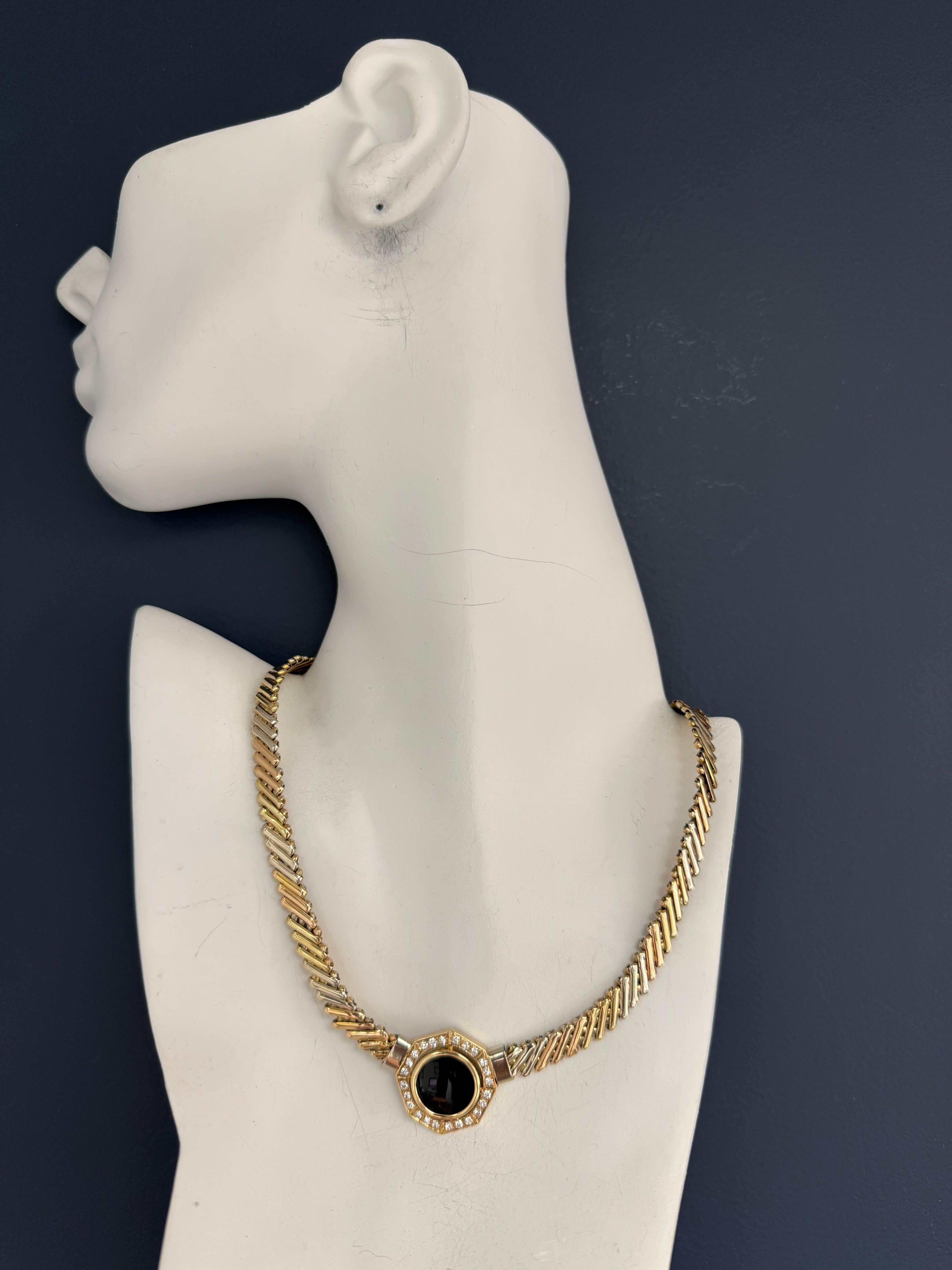 This retro necklace is crafted in 14K tricolor gold—rose, yellow, and white—totaling 44.2 grams and measuring 17 inches long. The chain is 6.5 mm wide and set with 24 colorless round brilliant natural diamonds weighing approximately 0.75 carats.