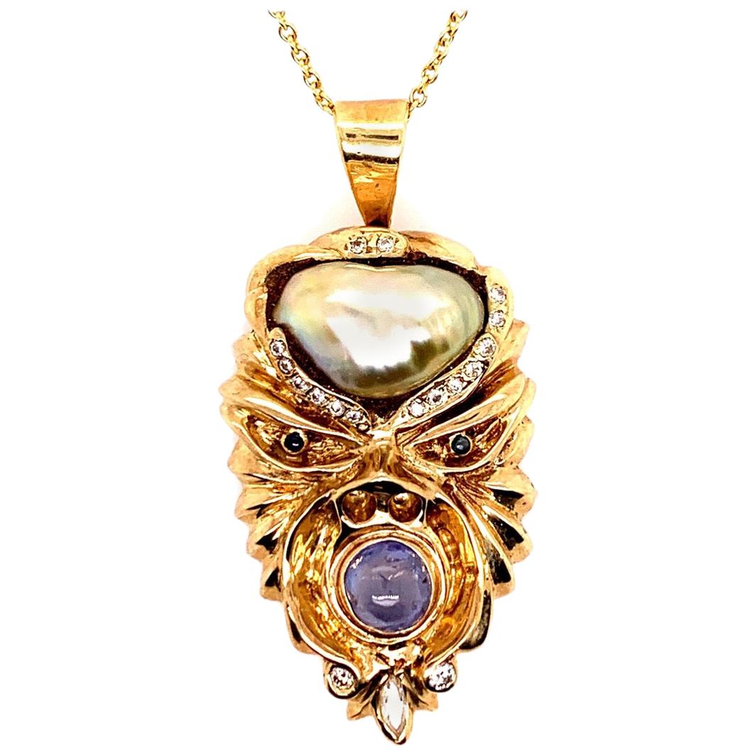 Retro Gold Warrior Head Natural Pearl, .30 Carat Diamond & Sapphire Pendant 1950