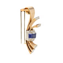 Retro Gübelin Gold, Diamond, and Sapphire Clip Brooch of Stylized Bow Design