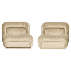 Retro-Inspired Armchair with Curved Silhouette in Champagne Velvet Upholstery