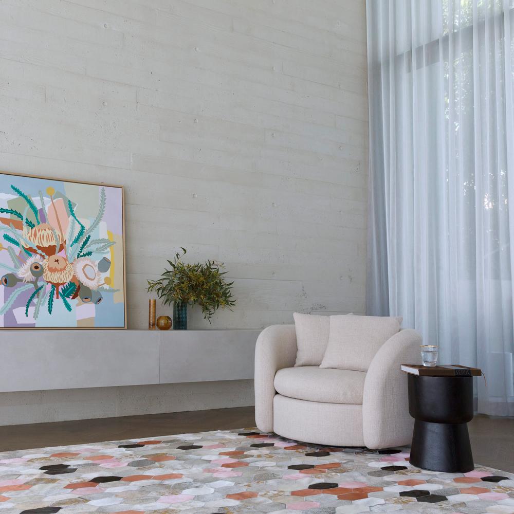 The retro, science fiction inspired Hornet features bold pops of vibrant colour with luxe gold detailing.

Playful yet evocative, the Hornet takes its cues from the rich colours of the desert and fun poolside style.

Art Hide cowhide rugs are