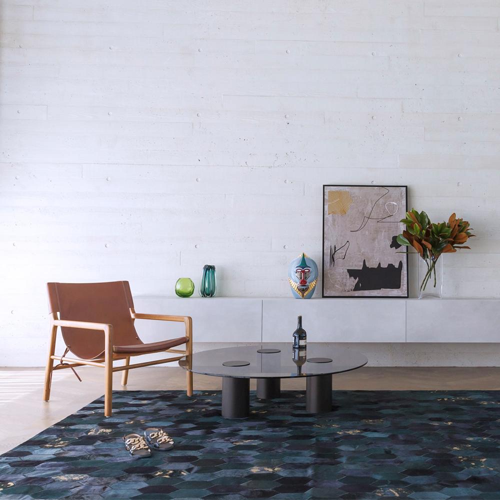 The retro, science fiction inspired Hornet features bold pops of vibrant colour with luxe gold detailing.

Playful yet evocative, the Hornet takes its cues from the rich colours of the desert and fun poolside style.

Art Hide cowhide rugs are