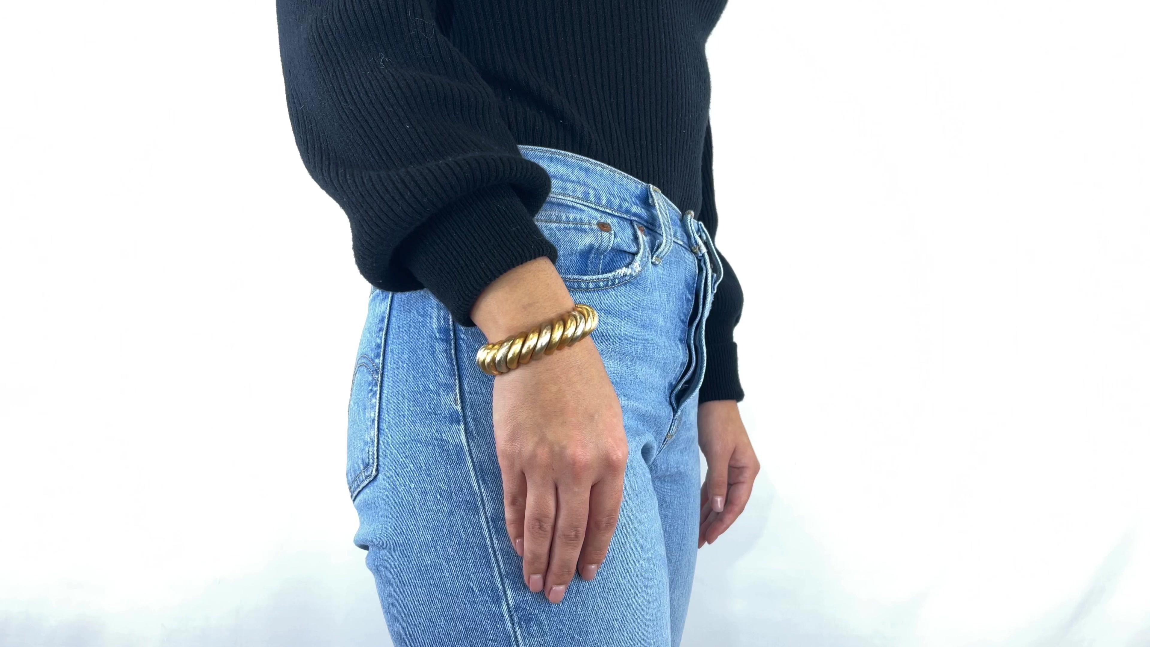 One Retro Italian 18k Gold Tricolor Bracelet. Crafted in 18 karat white, yellow, and rose gold. Circa 1950s. The bracelet measures 7 3/4 inches and best fits a wrist measuring 6 - 7 1/2 inches.

About The Piece: If you are someone who expresses