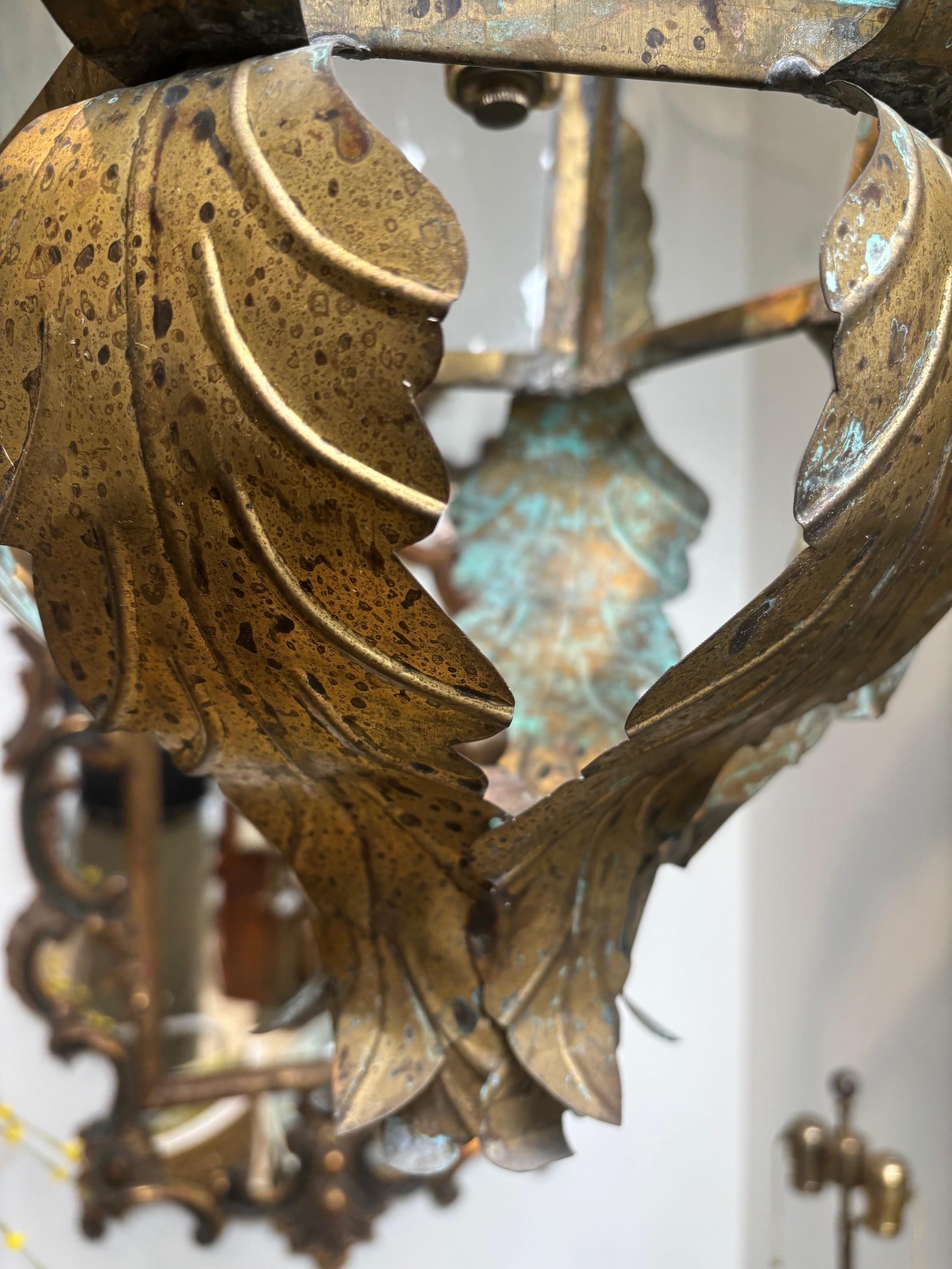 Retro Italian Handcrafted Solid Brass and Clear Glass Electrified Six Sided Tole Lantern,
Hanging Tole Lantern, Electrified with 3-Light Candelabra Light Fixture, 
12v Candelabra Light Bulb
Includes: 3-Resin Ivory Candle sleeve and Chain
Dimensions: