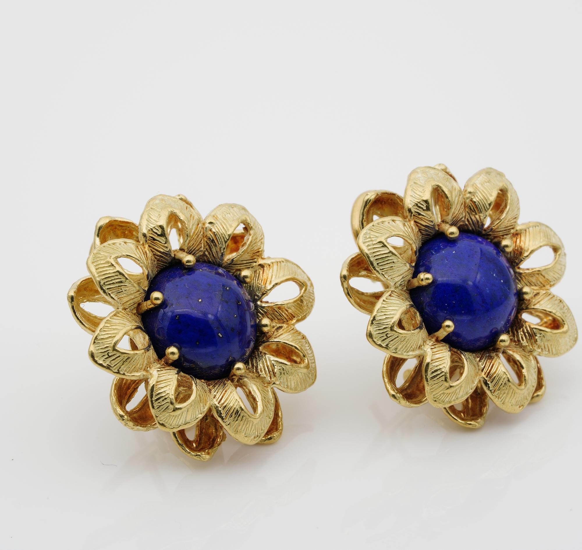 Italian Retro large carved flower earrings 1945 ca
18 KT solid gold
Flower shaped in a rich corolla of petals to complement Lapislazuli of rich royal Blue
The two cabochon cut measuring 11 mm in diameter
Charming in design and artistry hand