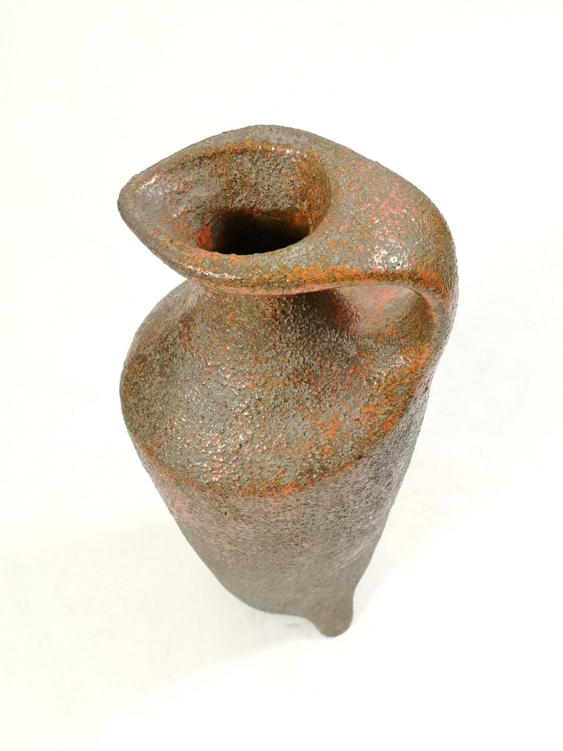 This large floor vase with a special shape was designed by Margit Csizmadia in 1967 for the factory in Peshidegkút, Hungary. This yellow-green retro vase is in perfect condition, a unique handmade piece.

