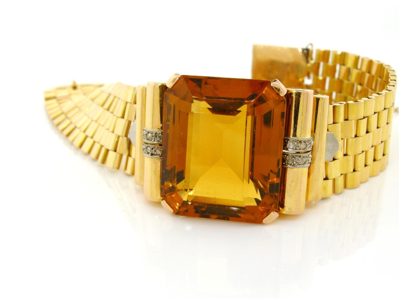 Original 1940s' 57.00 carat orange emerald cut Madeira Citrine 18KT yellow gold bracelet.  Domed shoulders dotted with two rows of small sparkly rose cut diamonds lead to the supple link bracelet.  Classic Retro Statement!