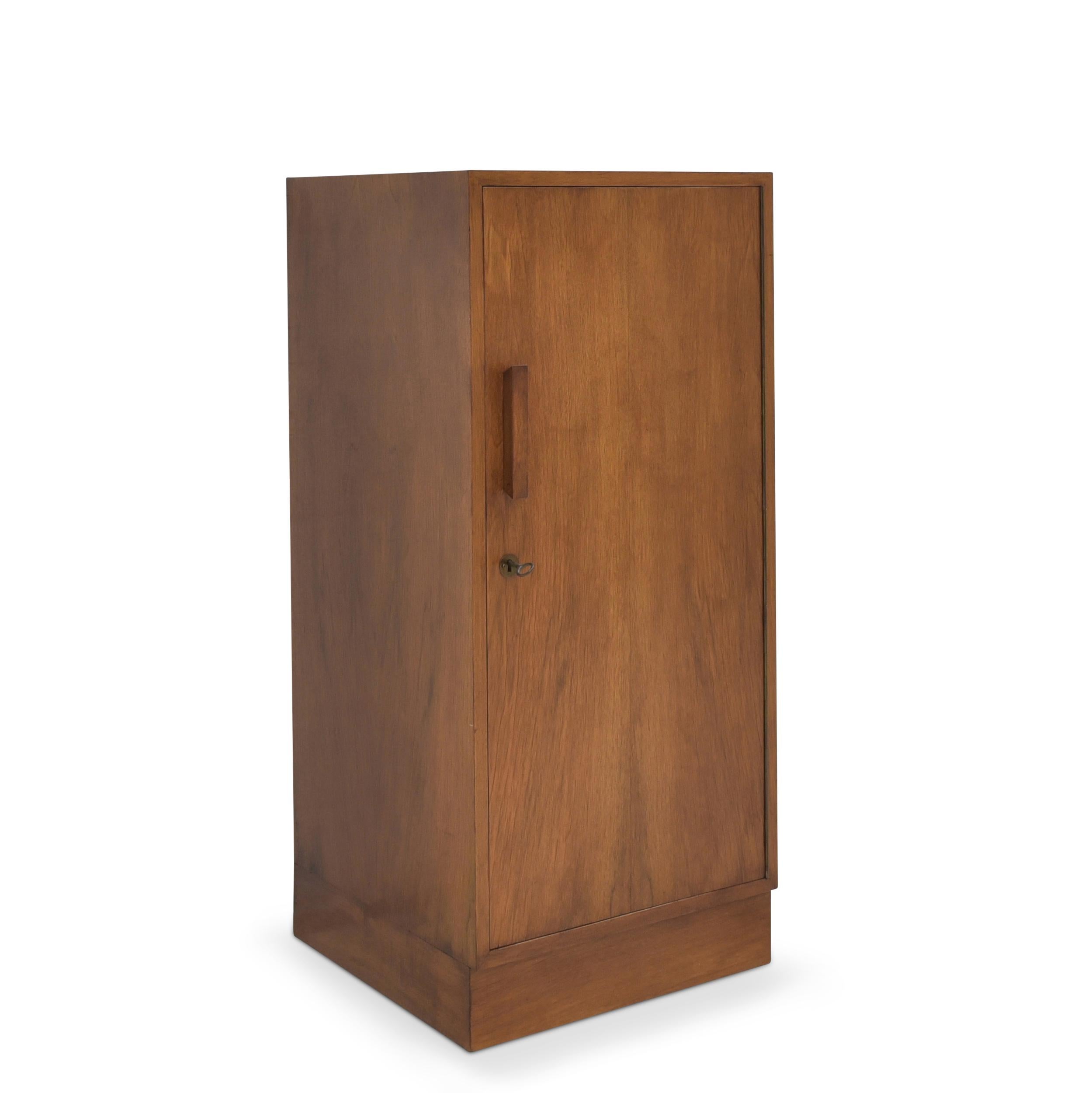 Retro Narrow Chest of Drawers Restored midcentury Art Deco 1950 Cabinet Small

Features:
Single-door model with ten glass shelves
Original handle and fittings
No-nonsense design
Beautiful patina

Additional information:
Material: Walnut