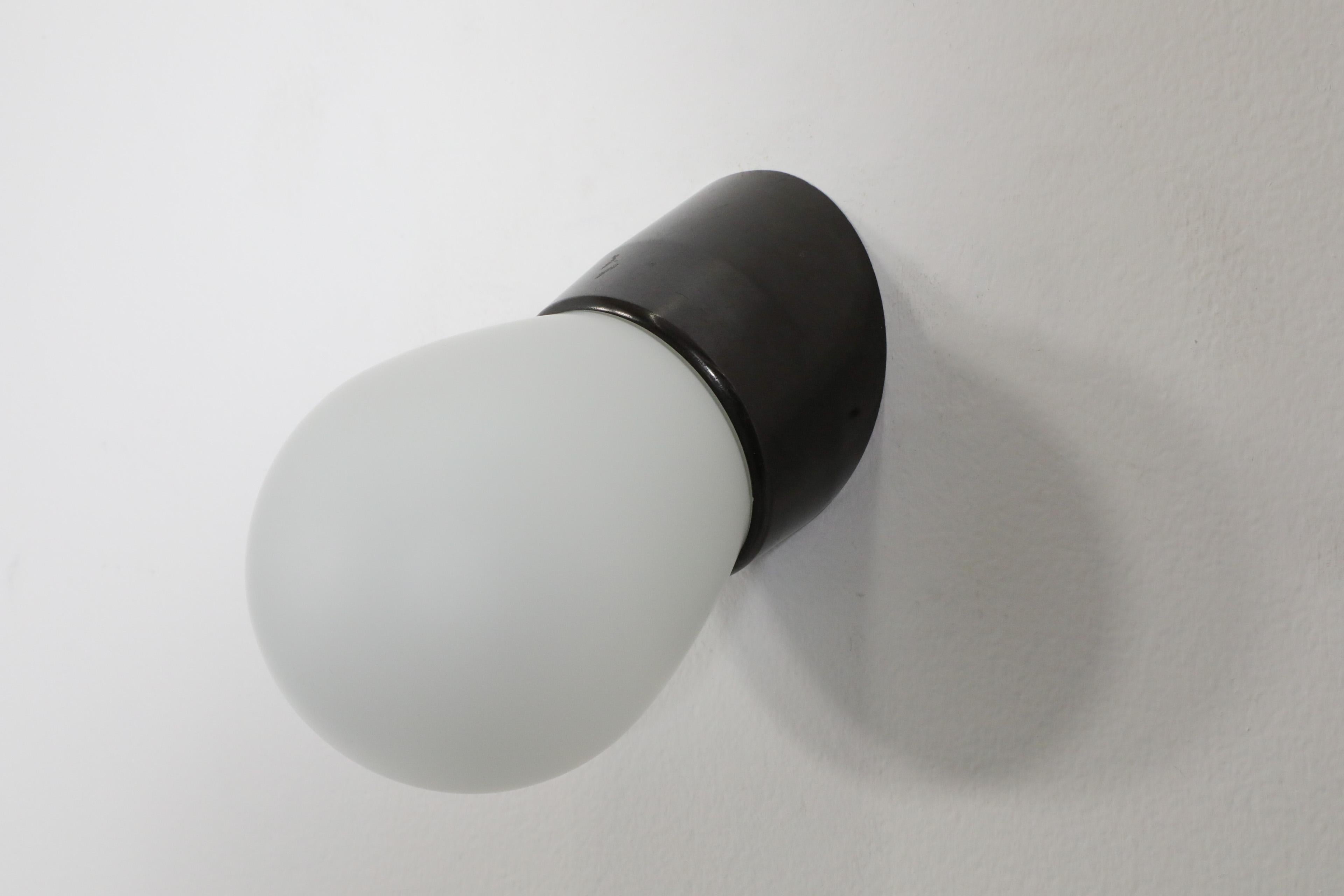 Retro Mid-Century Frosted Bulbous Glass Sconce with Angled Black Bakelite Base For Sale 1