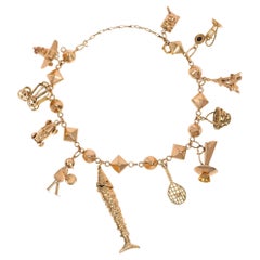 Retro Mid-Century Gold Stud-Link Bracelet with Eleven Charms