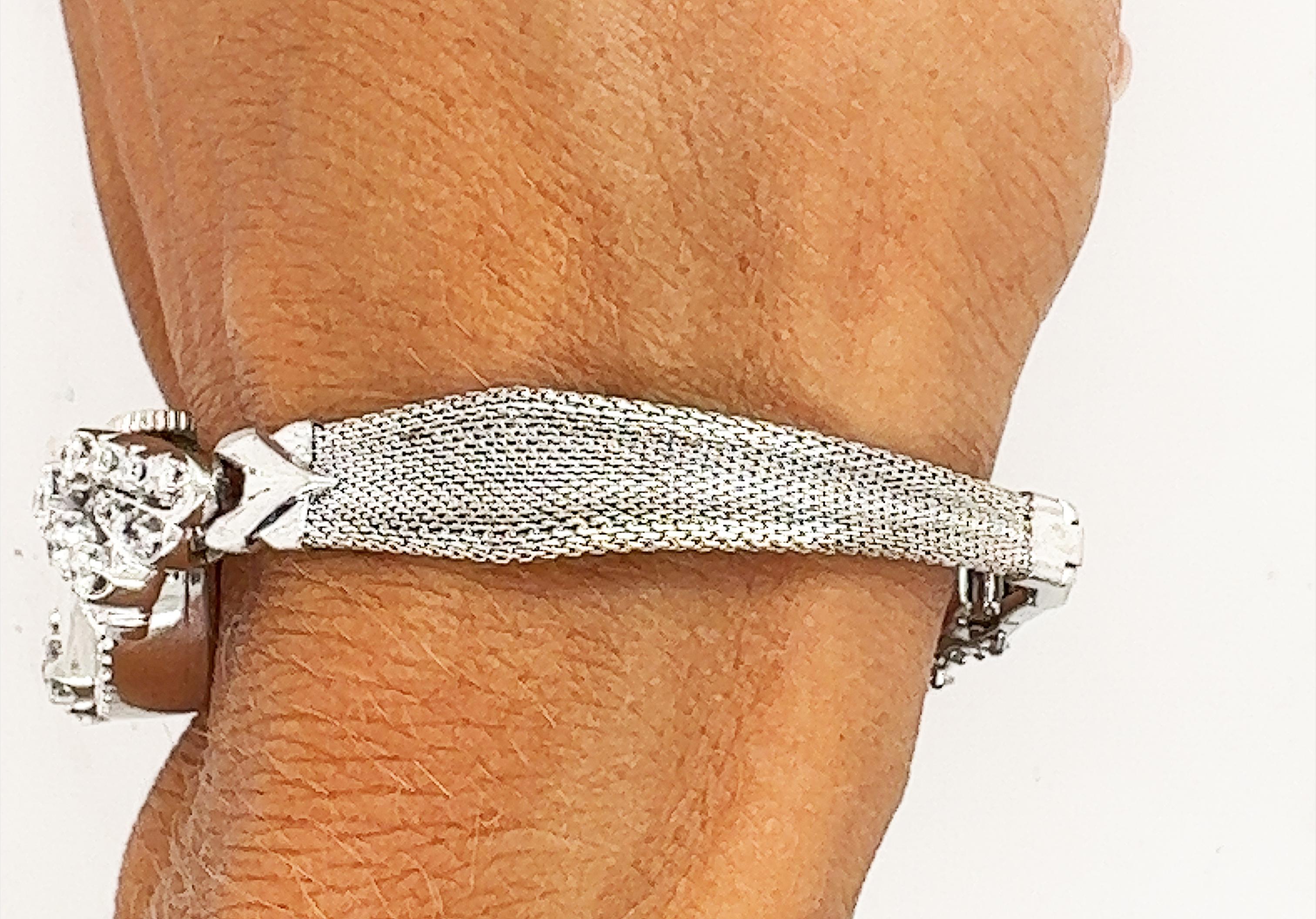 Retro Damenarmbanduhr aus der Mitte des Jahrhunderts .90 Karat Diamant 14K Original 1965 2