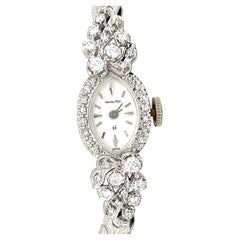 Retro Damenarmbanduhr aus der Mitte des Jahrhunderts .90 Karat Diamant 14K Original 1965