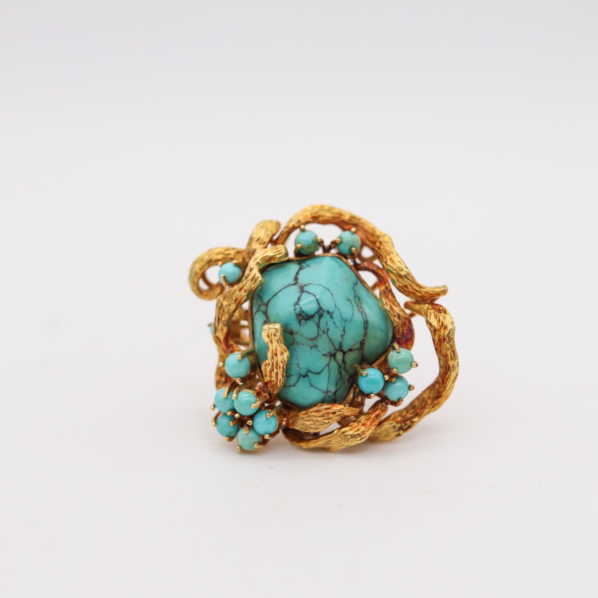 Retro modernist cocktail ring with turquoises.

A gorgeous sculptural cocktail ring, created with voluptuous organic free shapes during the mid-century period, back in the 1960. This ring is very beautiful and unusual and has been designed with