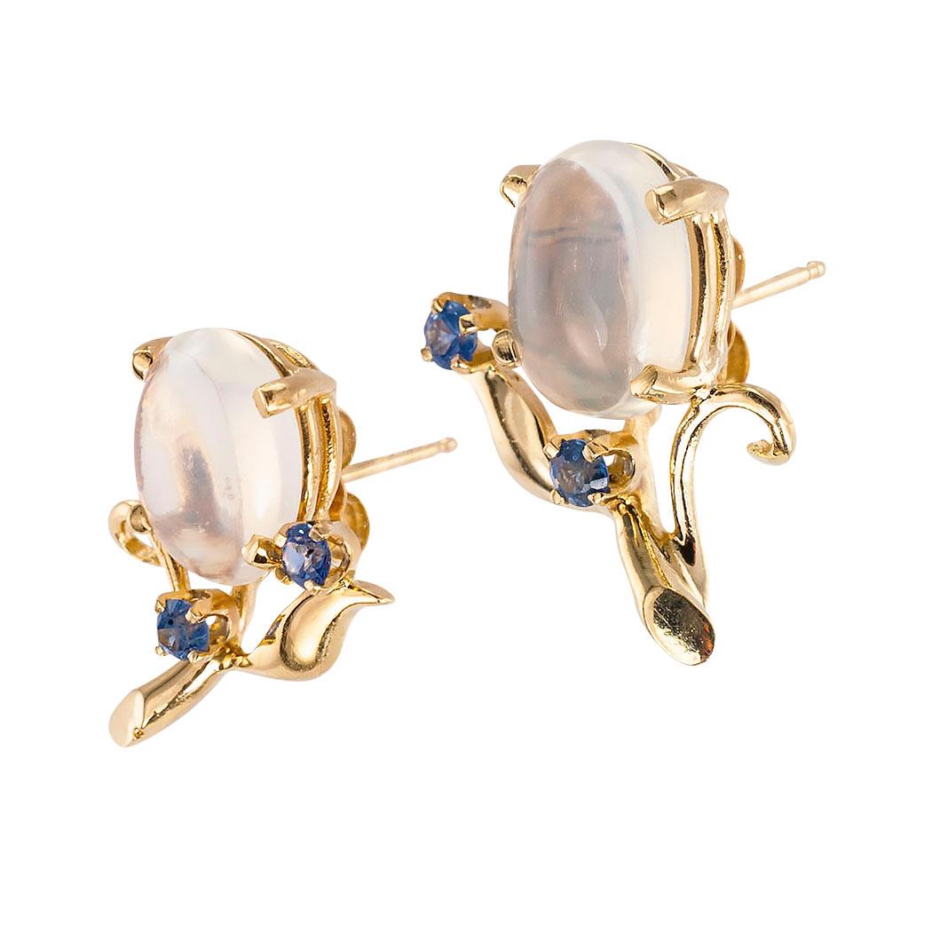 Retro moonstone blue sapphire and yellow gold button earrings circa 1950.
Love them because they caught your eye and we are here to connect you with beautiful and affordable jewelry.  Make yourself happy!  Simple and concise information you want to