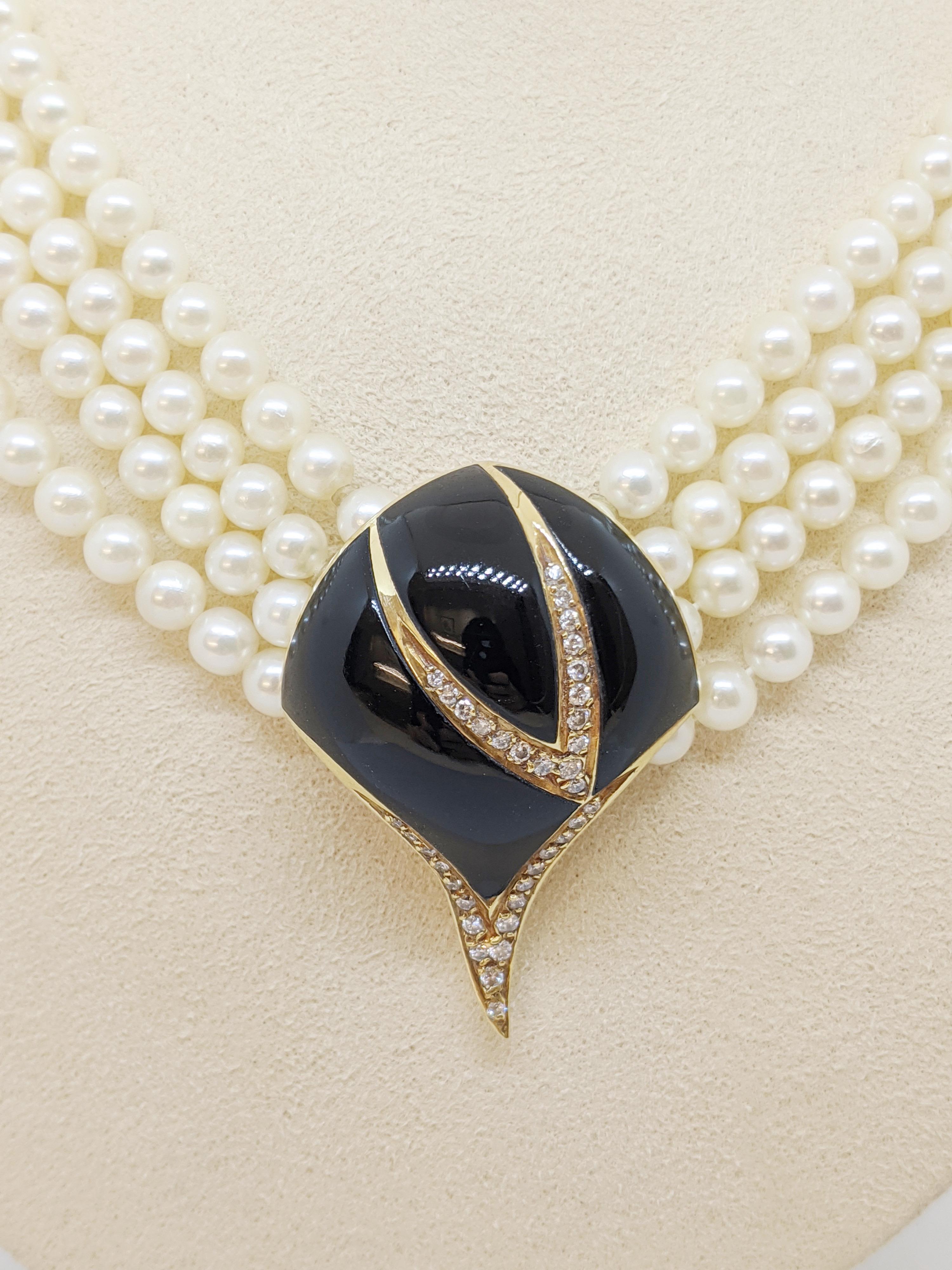 Retro Multi Strand Pearl Necklace with Black Onyx and .38 Carat Diamond Clasp In New Condition In New York, NY