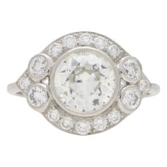 Retro Old Cut Diamond Halo Cluster Engagement Ring Set in Platinum