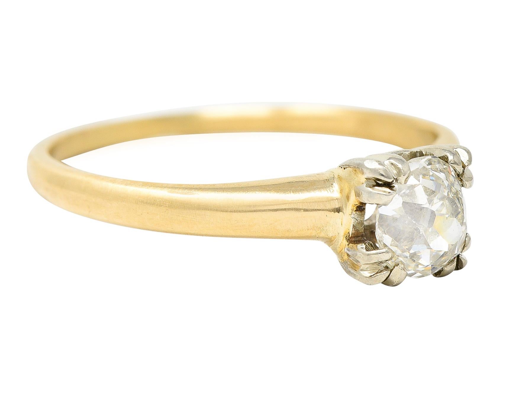 Featuring an heirloom old mine cut diamond weighing approximately 0.50 carat - J color with SI1 clarity. Set by triple prongs in a white gold square form head. Completes as a yellow gold shank. Tested as 14 karat gold. Circa: 1940s. Ring Size: 6 &