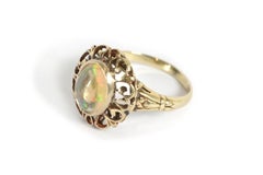 Retro opal ring in 14 karat rose gold, cabochon cut opal