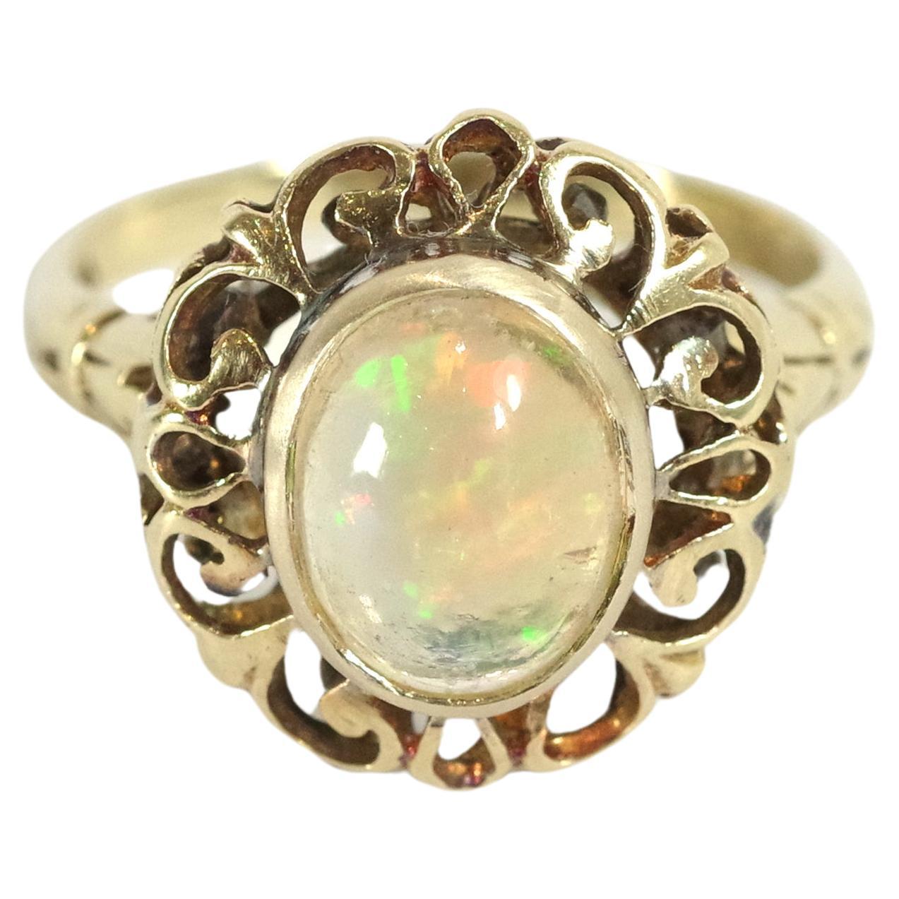 Retro opal ring in 14 karat rose gold, cabochon cut opal