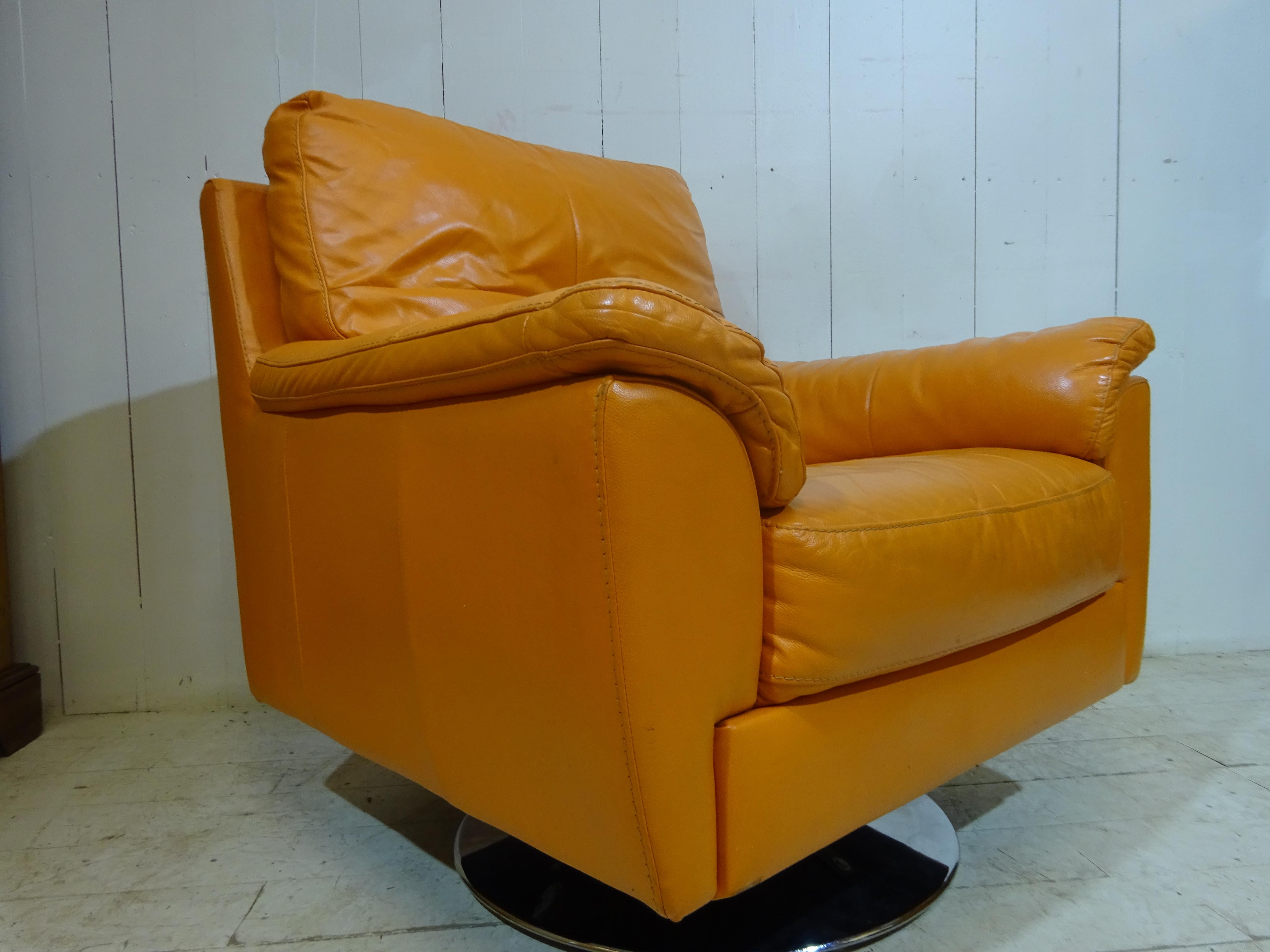Retro Orange Leather Swivel Chair For Sale at 1stDibs