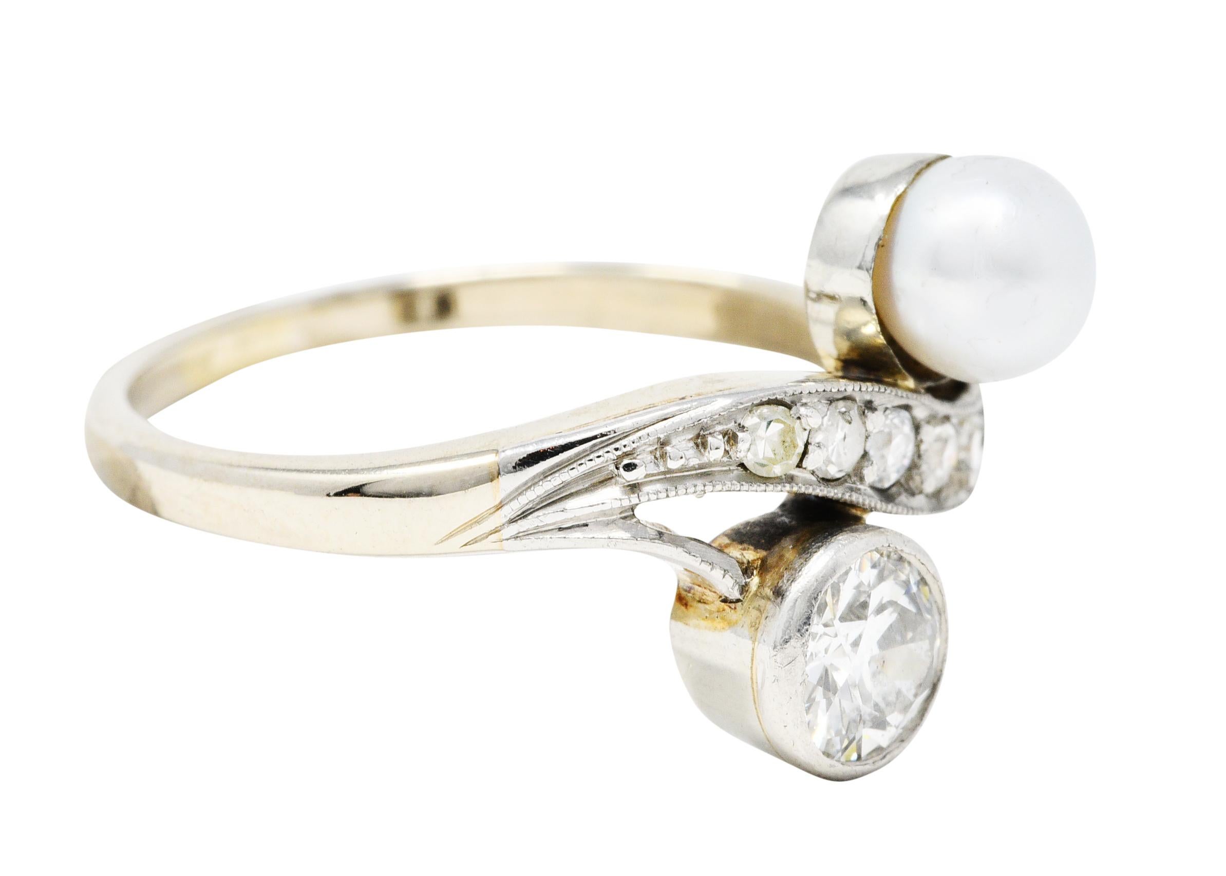 Bypass style ring features a pearl and old European cut diamond

Balanced in an Toi et Moi style - French to mean 