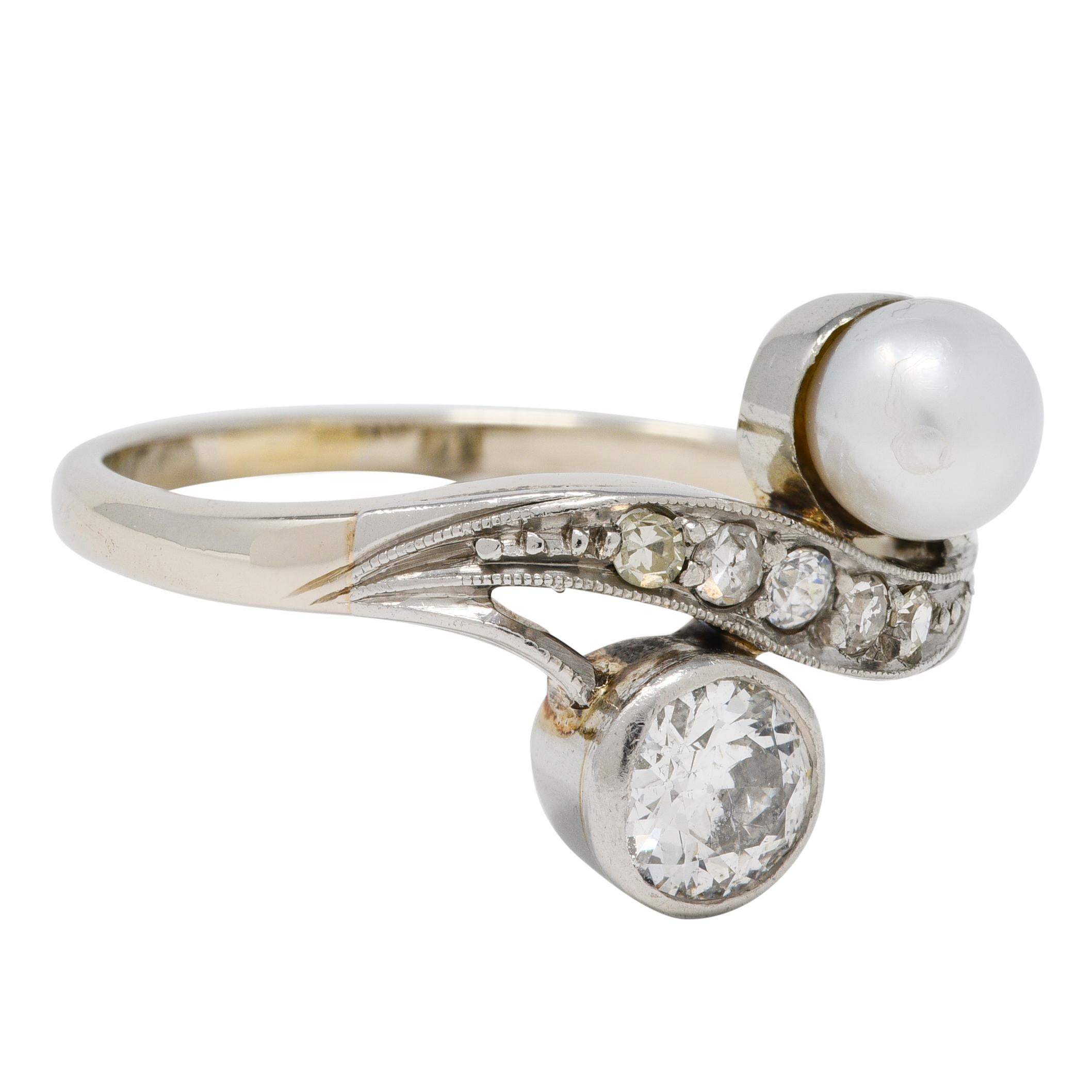 Bypass style ring features a pearl and old European cut diamond
Balanced in a Toi et Moi style - French to mean 