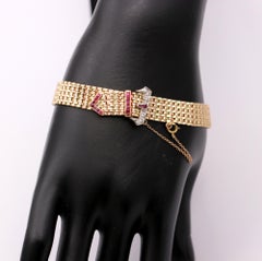 Retro Period Gold and Palladium Buckle Bracelet with Diamonds and Rubies