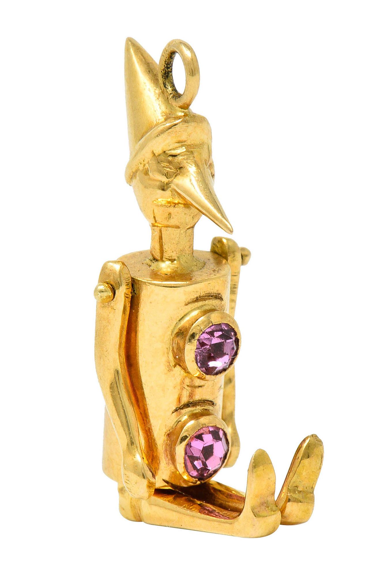 Retro Pink Sapphire 18 Karat Gold Articulated Pinocchio Charm In Excellent Condition In Philadelphia, PA