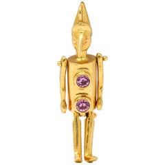 Retro Pink Sapphire 18 Karat Gold Articulated Pinocchio Charm