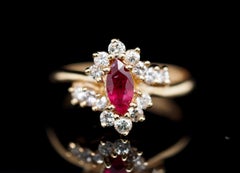 Retro Pink Sapphire and Diamond Vintage Marquise Ring in 14 Karat Yellow Gold