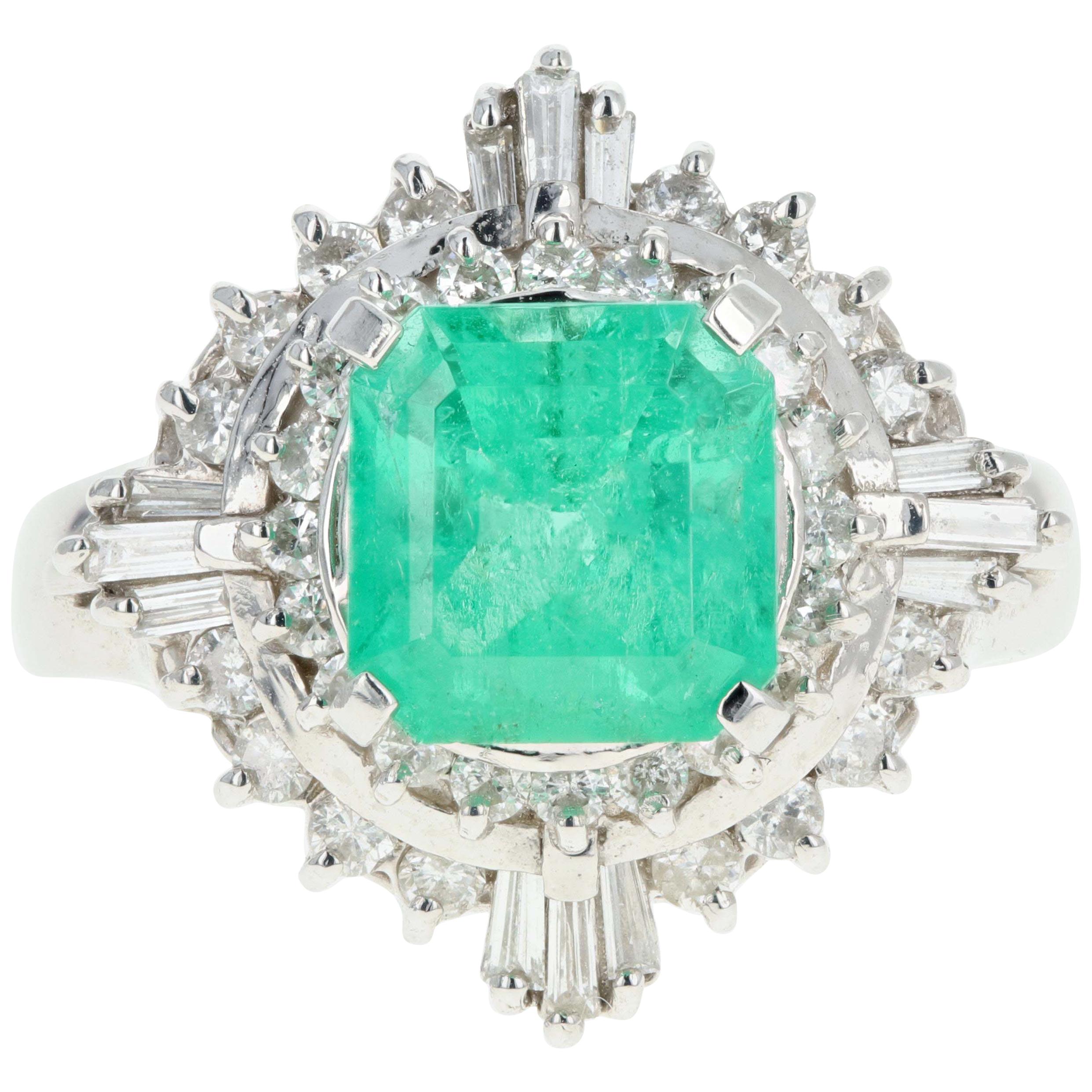 Retro Platinum 1.83 Carat Emerald and Diamond Cocktail Ring