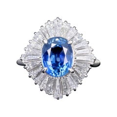 Retro Platinum 2.17 Carat Natural Sapphire and Tapered Baguette Diamond Ring
