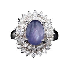 Retro Platinum 2.63 Carat Oval Cabochon Cut Natural Star Sapphire
Diamond Retro Platinum 2.63 Carat Oval Cabochon Cut Natural Star Sapphire
Diamond